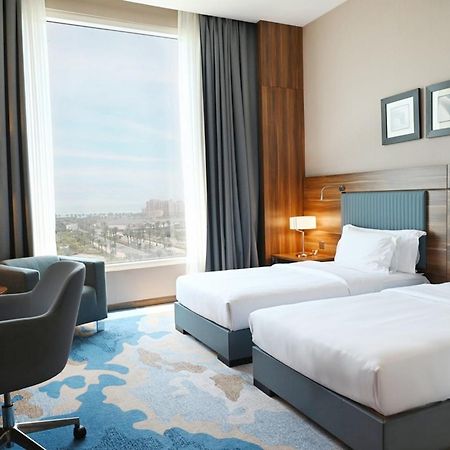 Bay La Sun Hotel And Marina - Emaar King Abdullah Economic City מראה חיצוני תמונה A room at the hotel