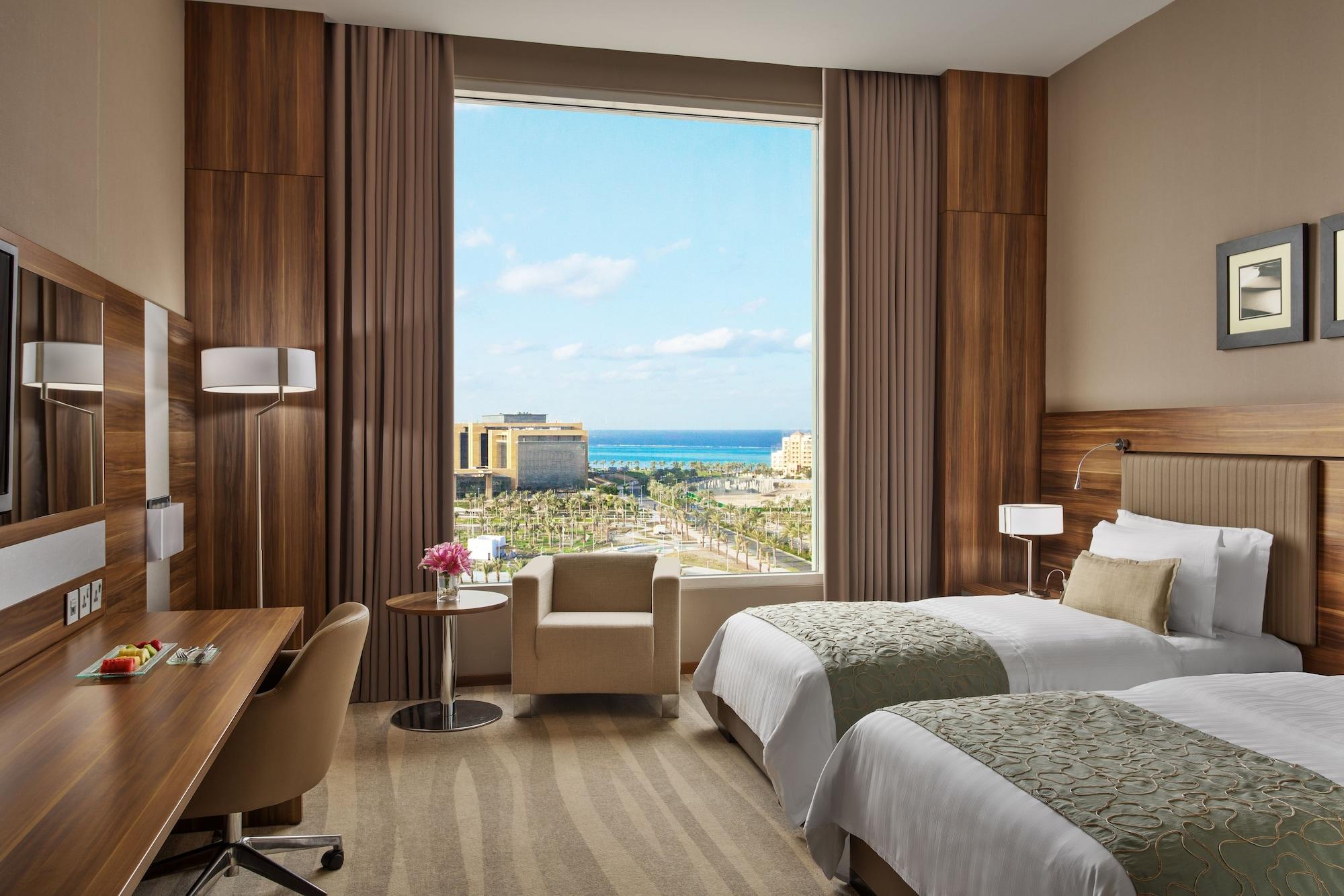 Bay La Sun Hotel And Marina - Emaar King Abdullah Economic City מראה חיצוני תמונה A room at the Hilton Nicosia