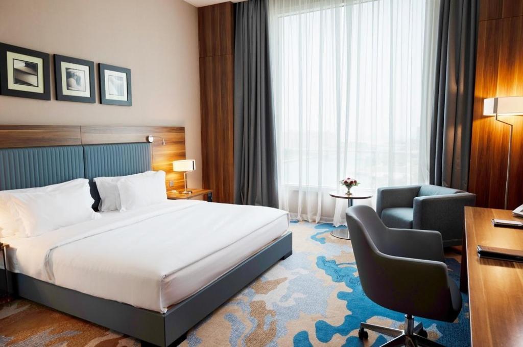 Bay La Sun Hotel And Marina - Emaar King Abdullah Economic City מראה חיצוני תמונה A room at the hotel